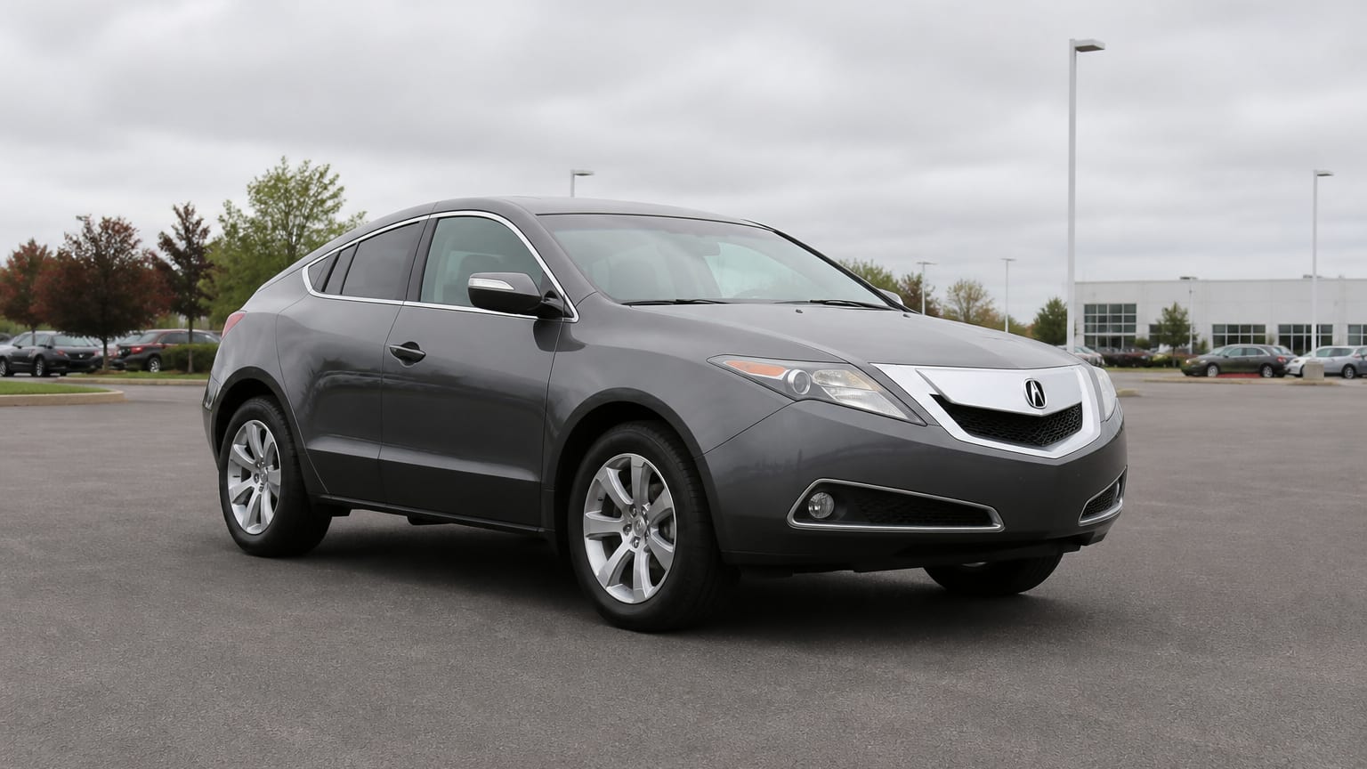 A higher-risk Acura ZDX model year parked in a dealership lot.