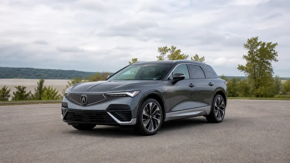 An Acura ZDX crossover, three-quarter front view, parked outdoors.