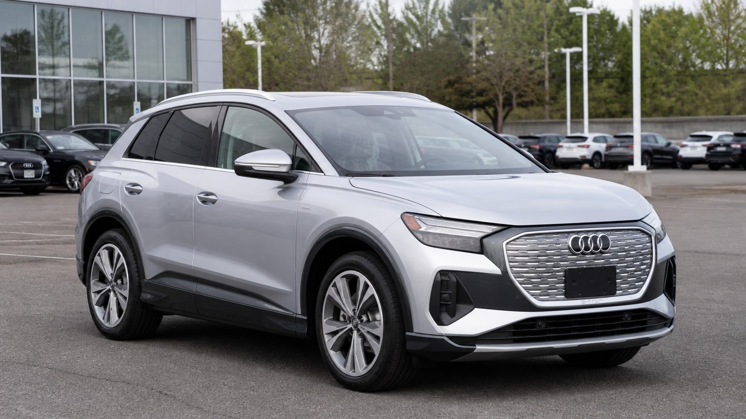 A higher-risk Audi Q4 e-tron model year parked in a dealership lot.