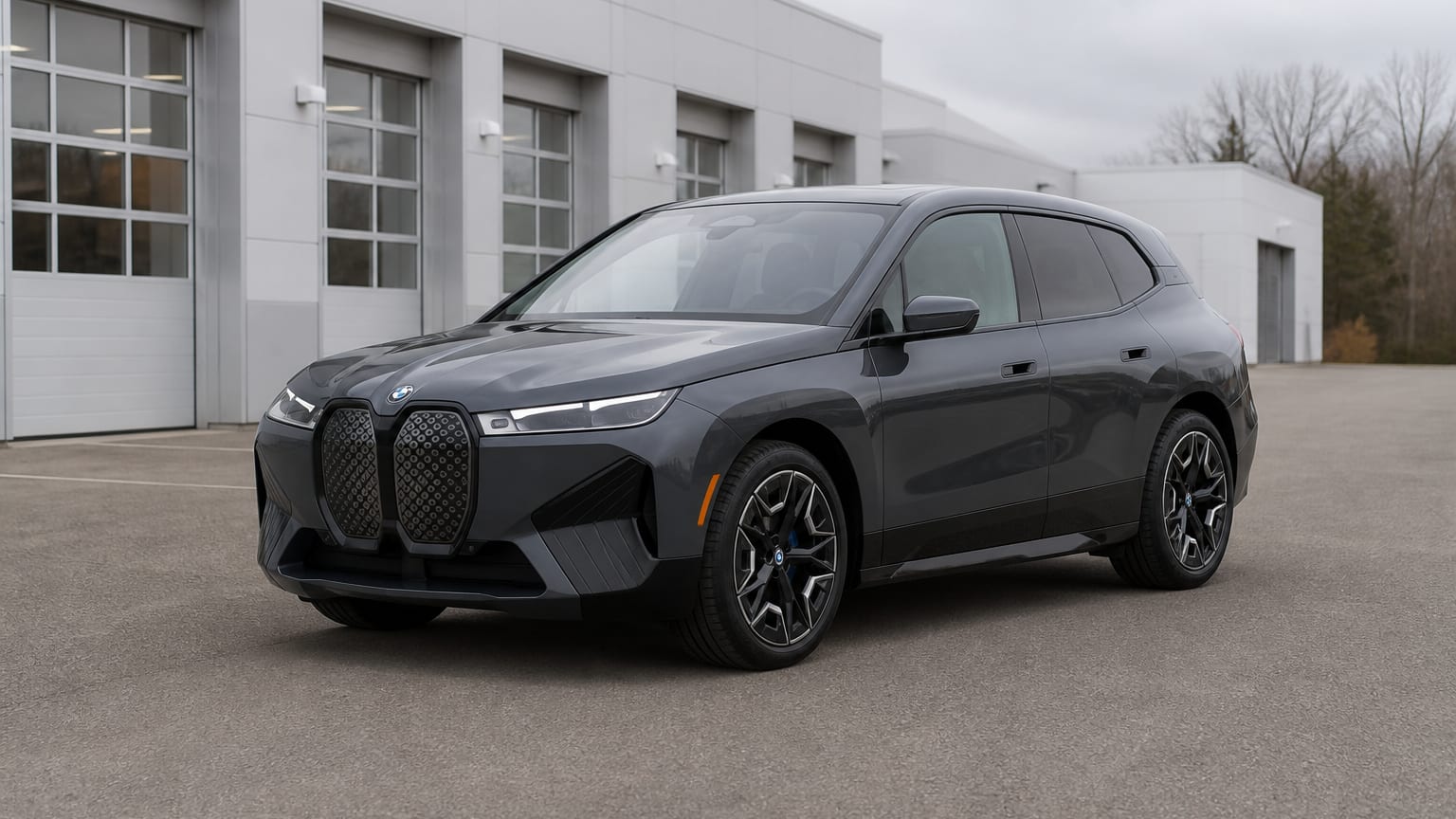 A higher-risk BMW iX model year parked in a dealership lot.