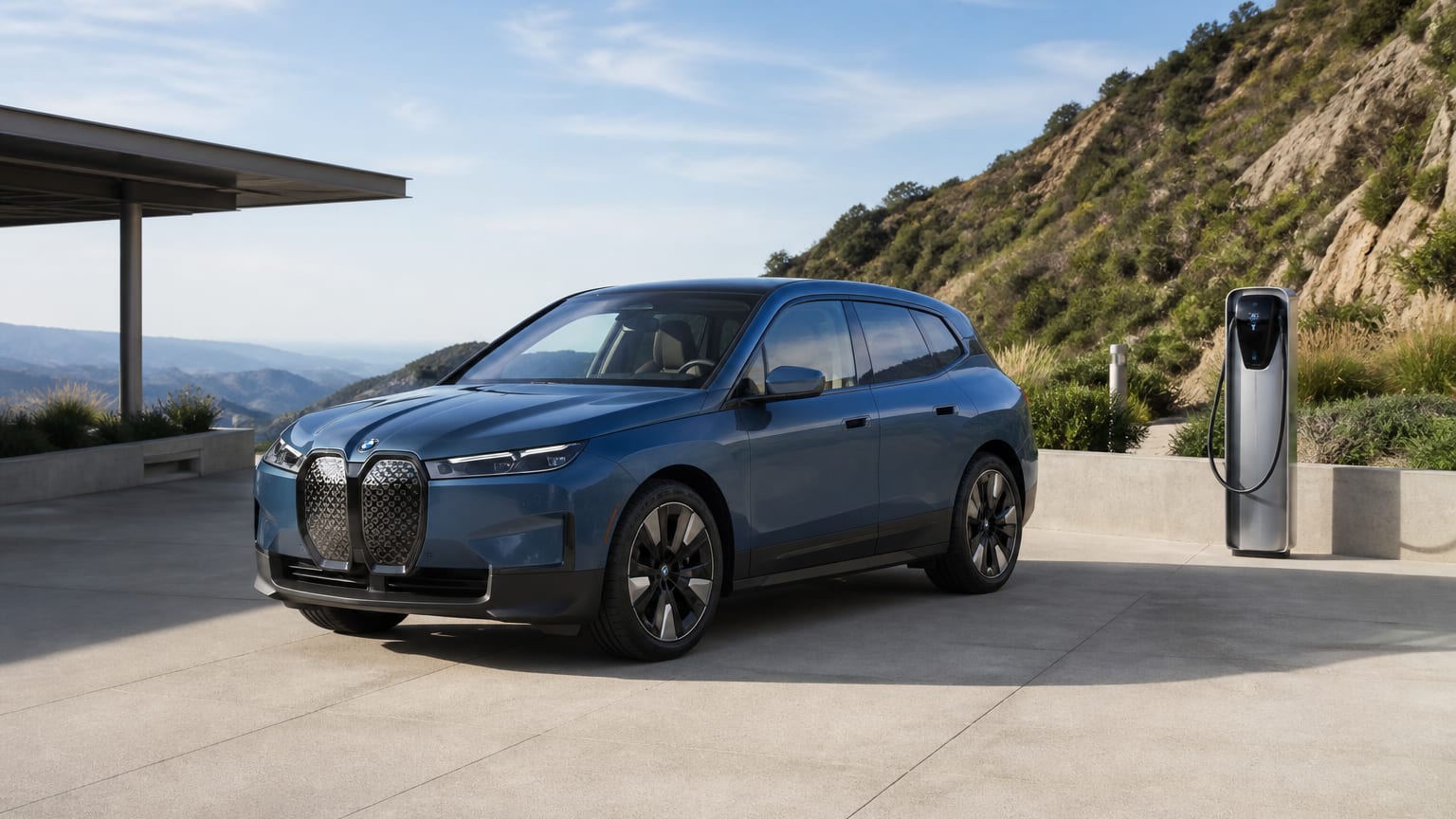 A BMW iX parked outdoors, three-quarter front view.
