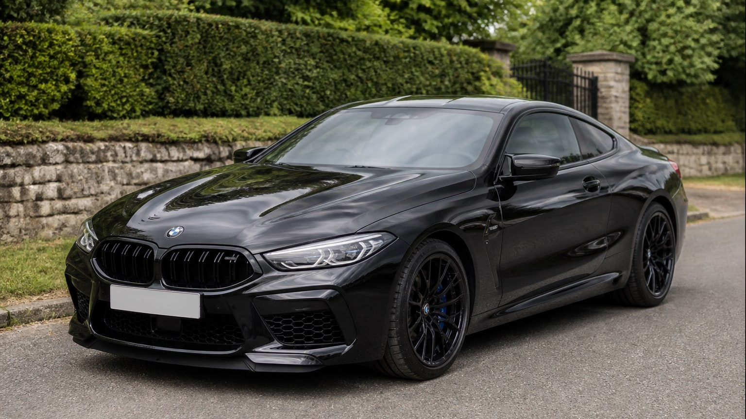 A BMW M8 parked outdoors, three-quarter front view.
