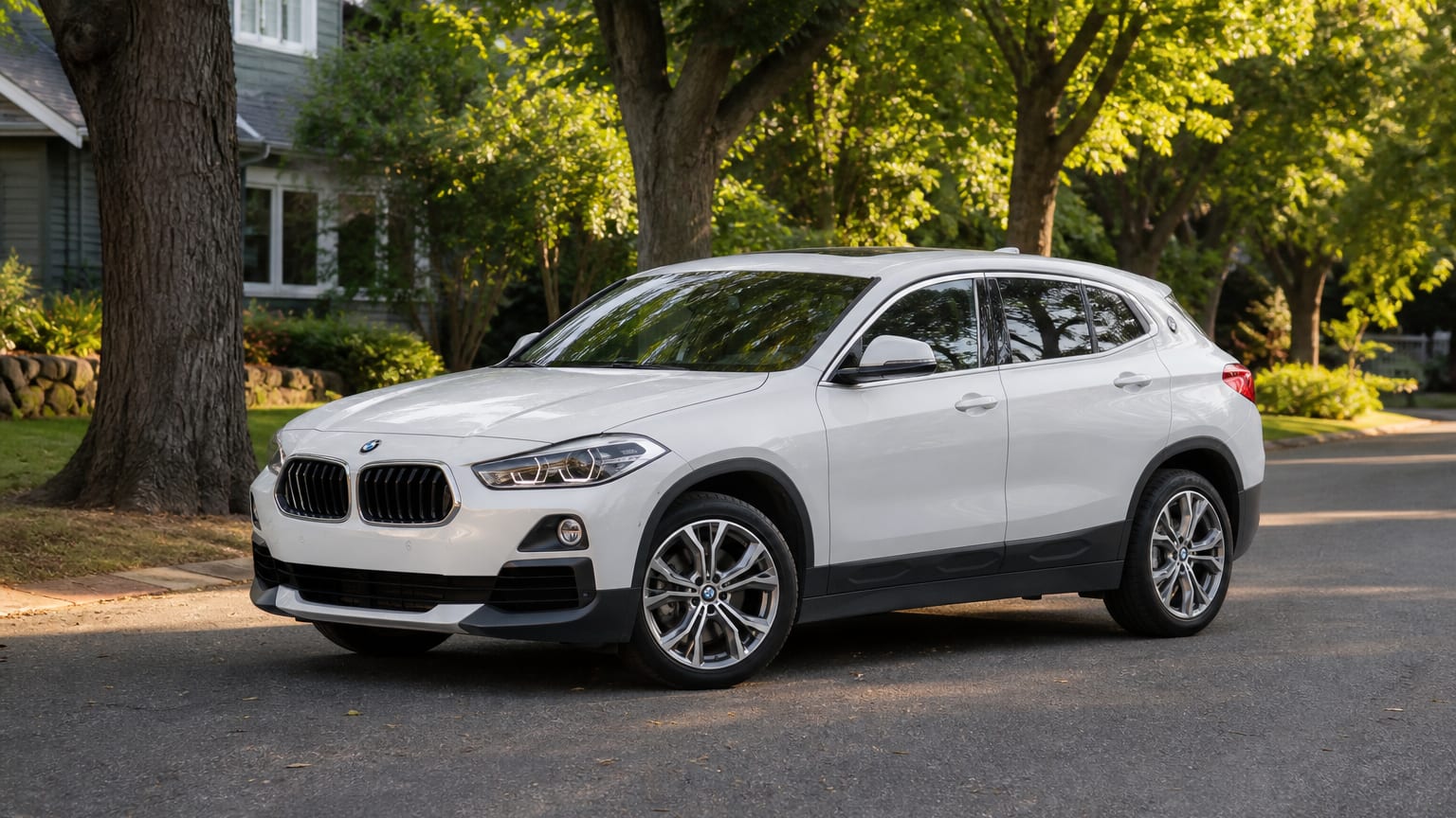 A cleaner later-model BMW X2 on a quiet road.