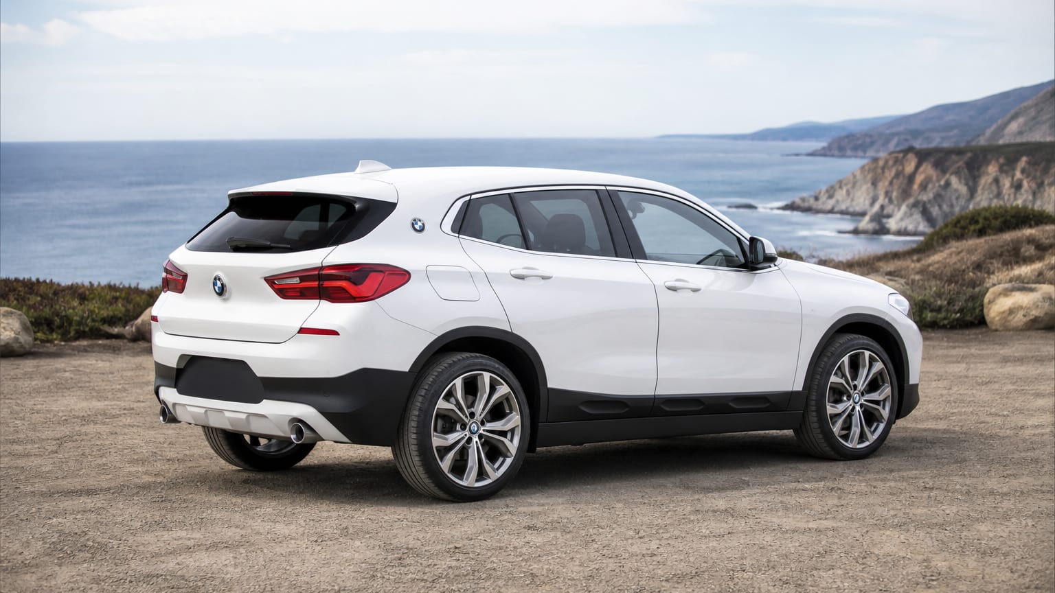 A BMW X2 parked outdoors, three-quarter front view.