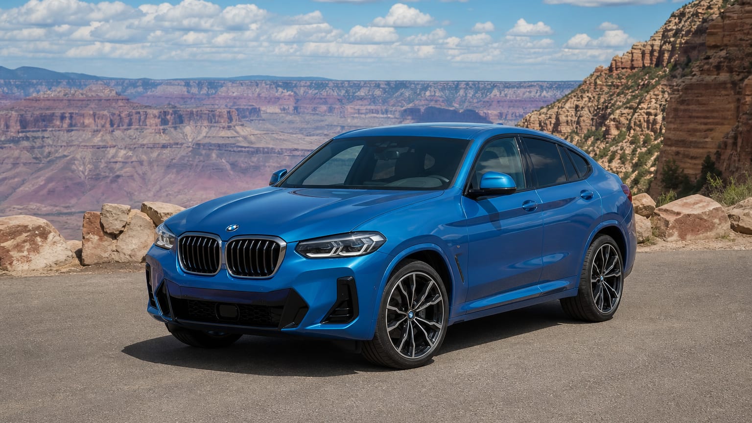 A BMW X4 parked outdoors, three-quarter front view.