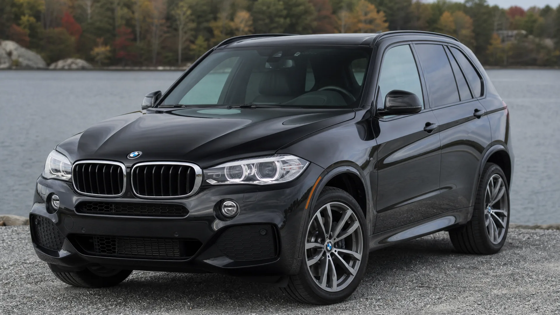 A black BMW X5 SUV parked outdoors.