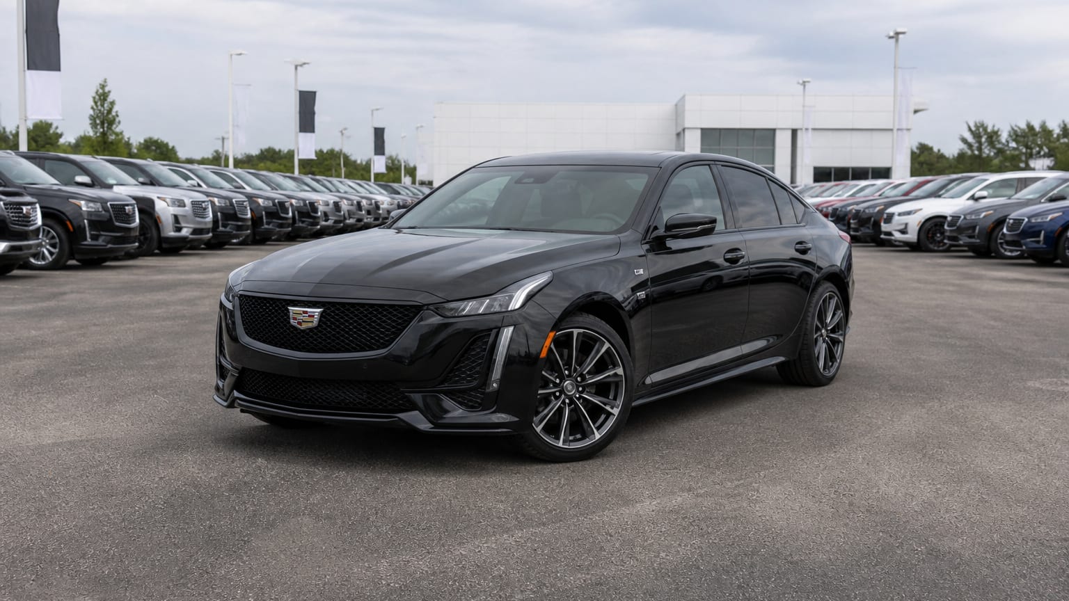 A higher-risk Cadillac CT5 model year parked in a dealership lot.