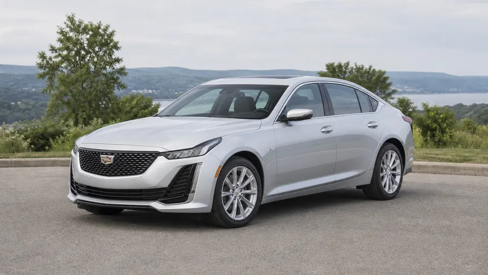 A Cadillac CT5 sedan, three-quarter front view, parked outdoors.