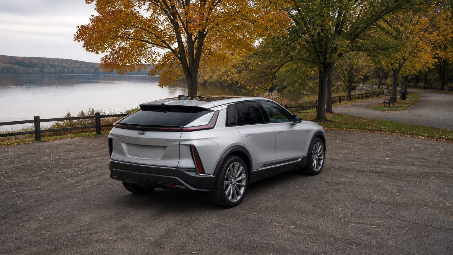 A Cadillac LYRIQ parked outdoors, three-quarter front view.