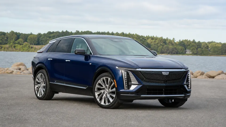 A Cadillac LYRIQ electric crossover, three-quarter front view, parked outdoors.