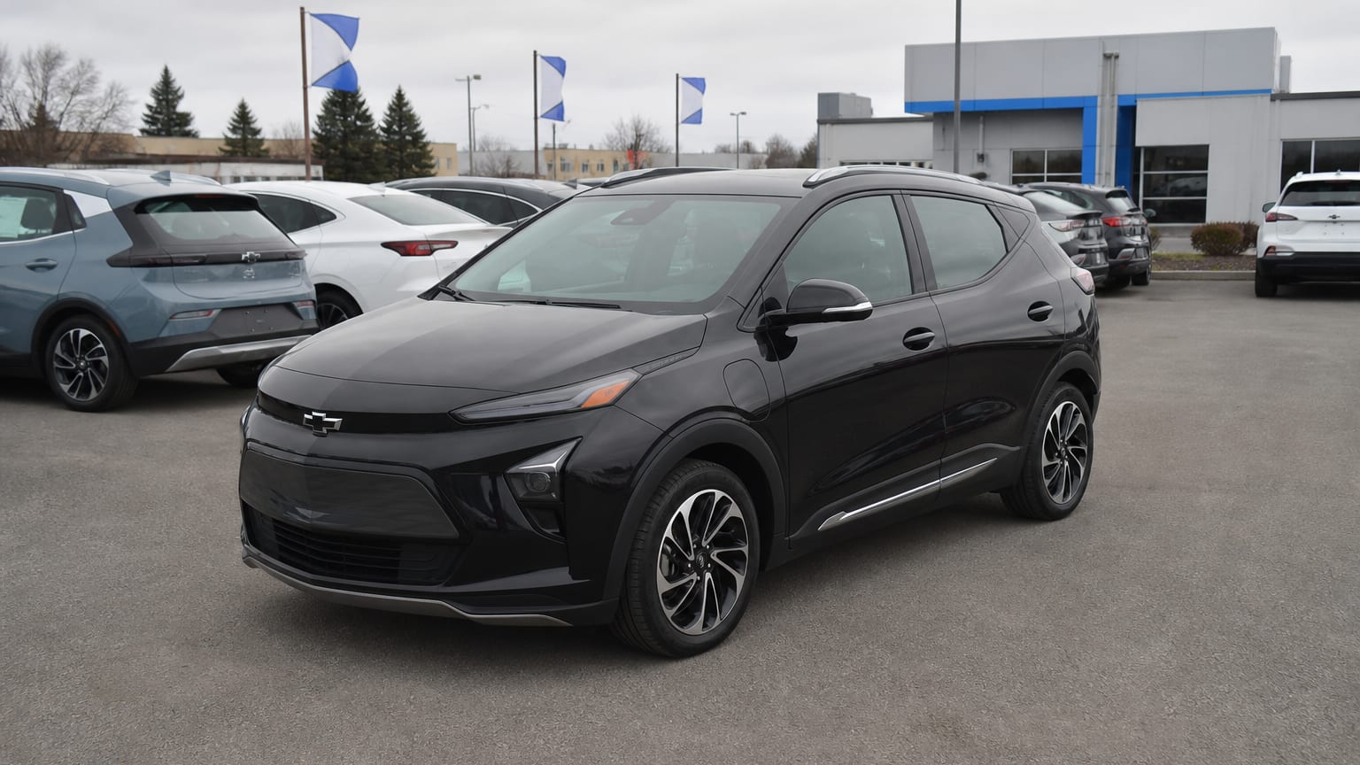 A higher-risk Chevrolet Bolt EUV model year parked in a dealership lot.