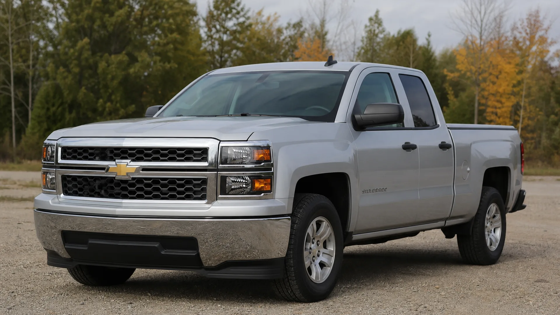 A silver Chevrolet Silverado pickup truck parked outdoors.