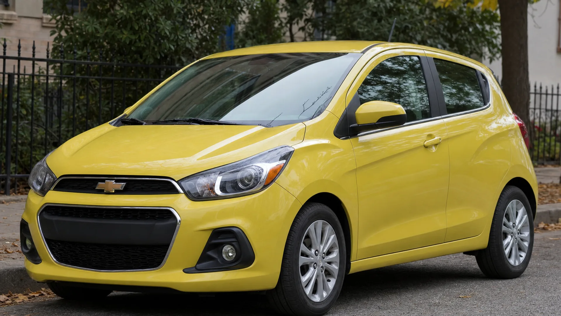 A Chevy Spark parked outdoors.