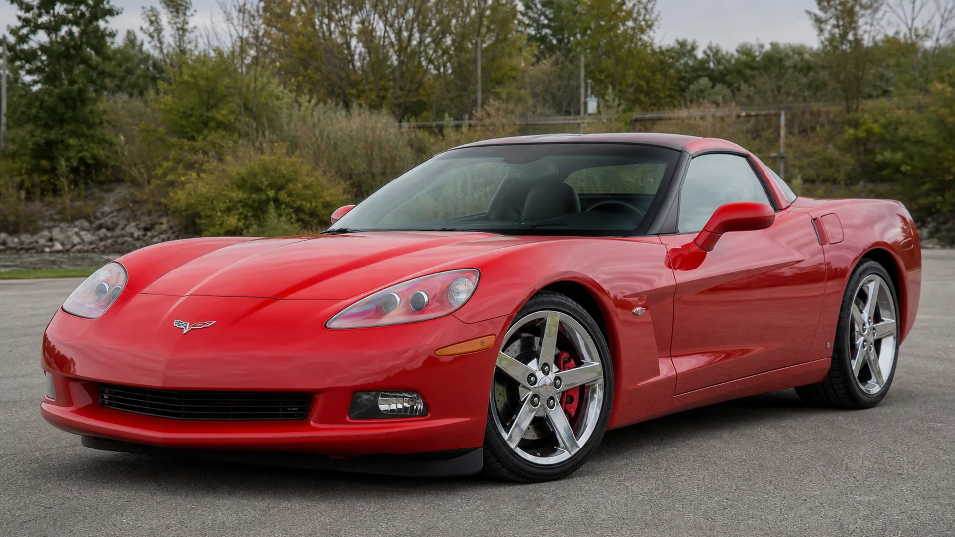 A Corvette C6 parked outdoors.