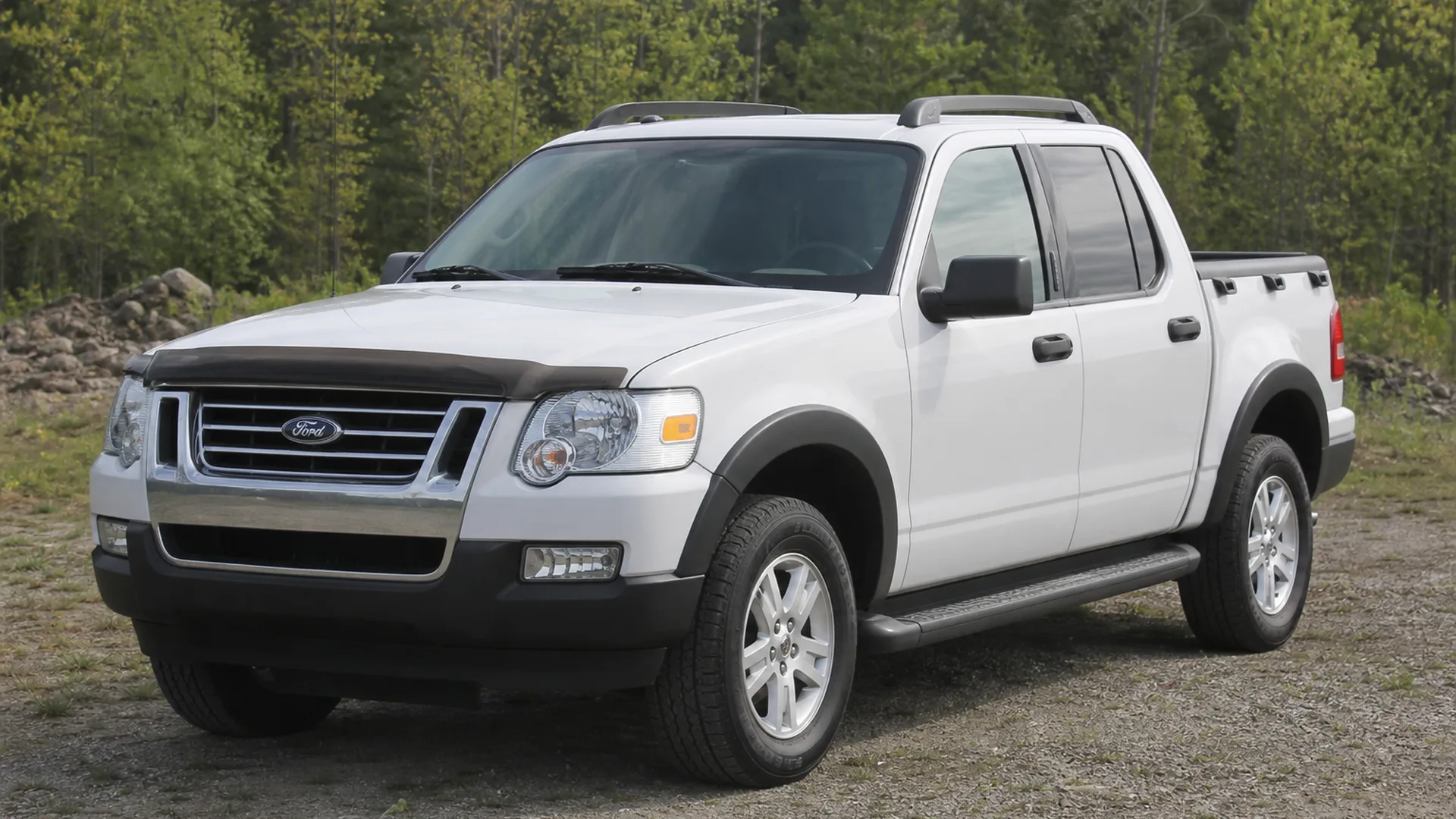 A Ford Explorer Sport Trac parked outdoors.