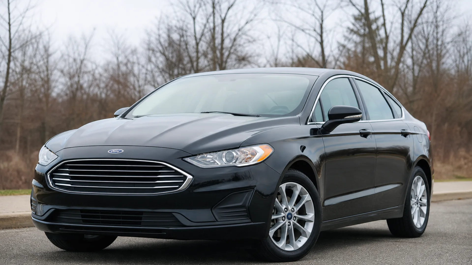 A Ford Fusion parked outdoors.
