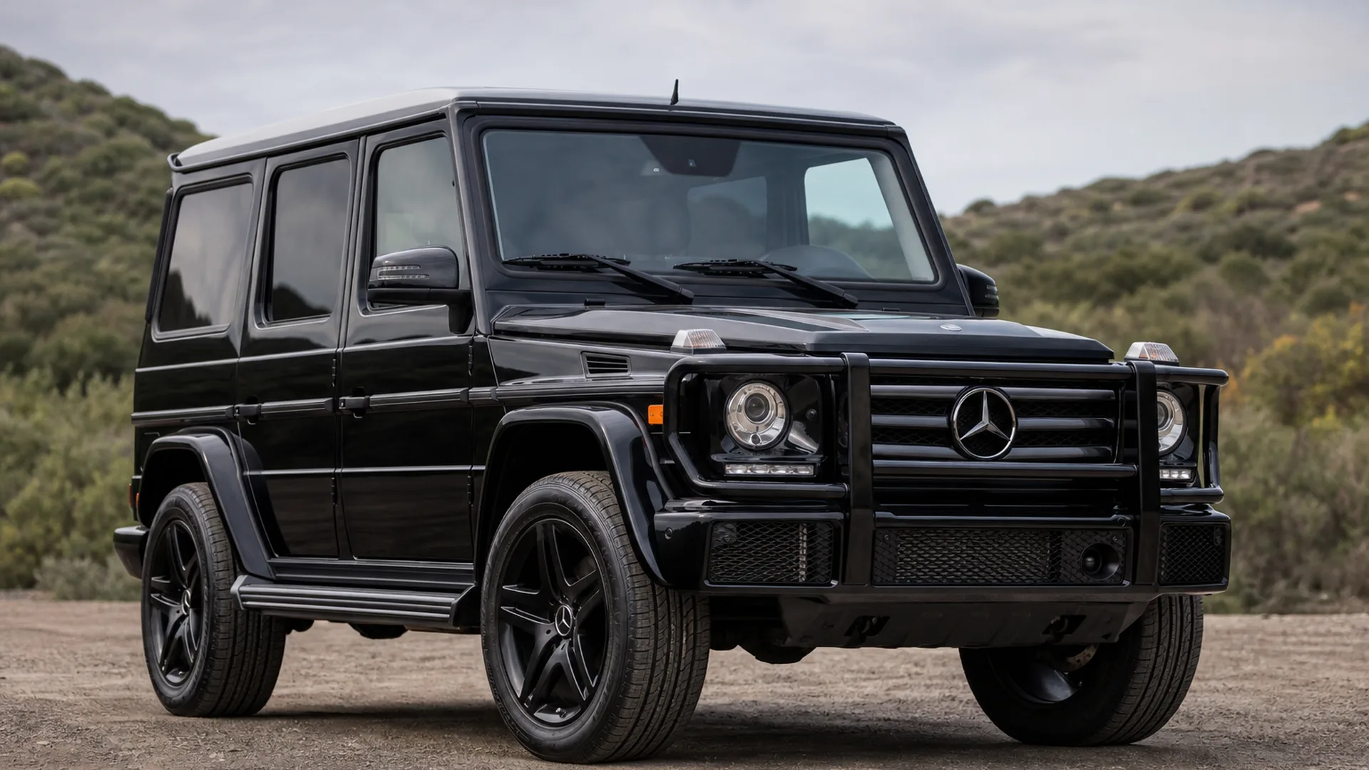 A Mercedes G Wagon parked outdoors.