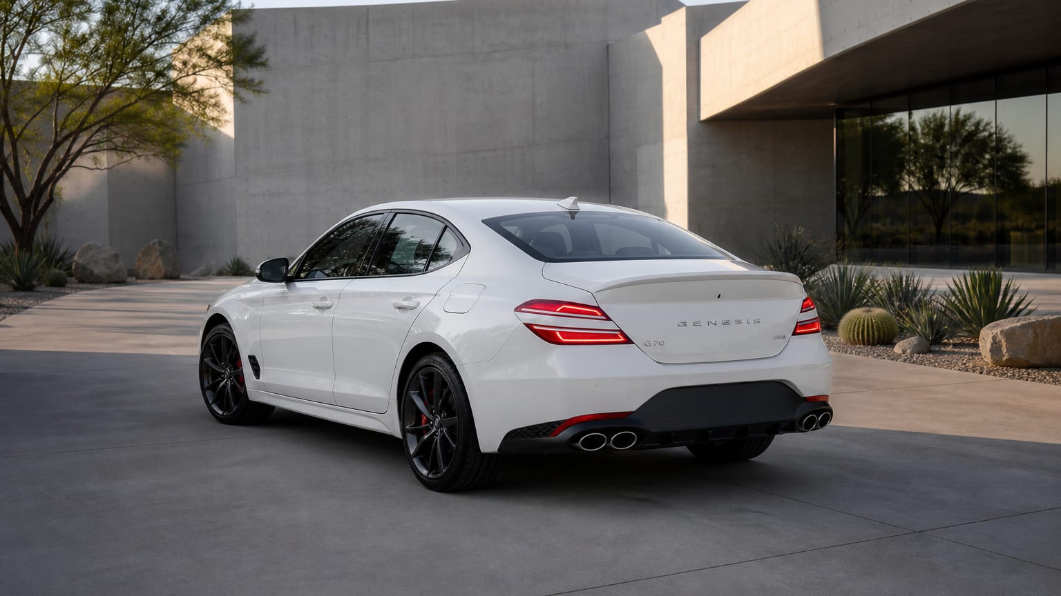 A Genesis G70 parked outdoors, three-quarter front view.