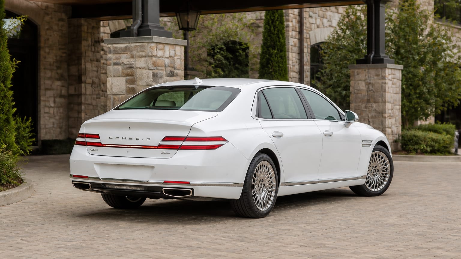 A Genesis G90 parked outdoors, three-quarter front view.