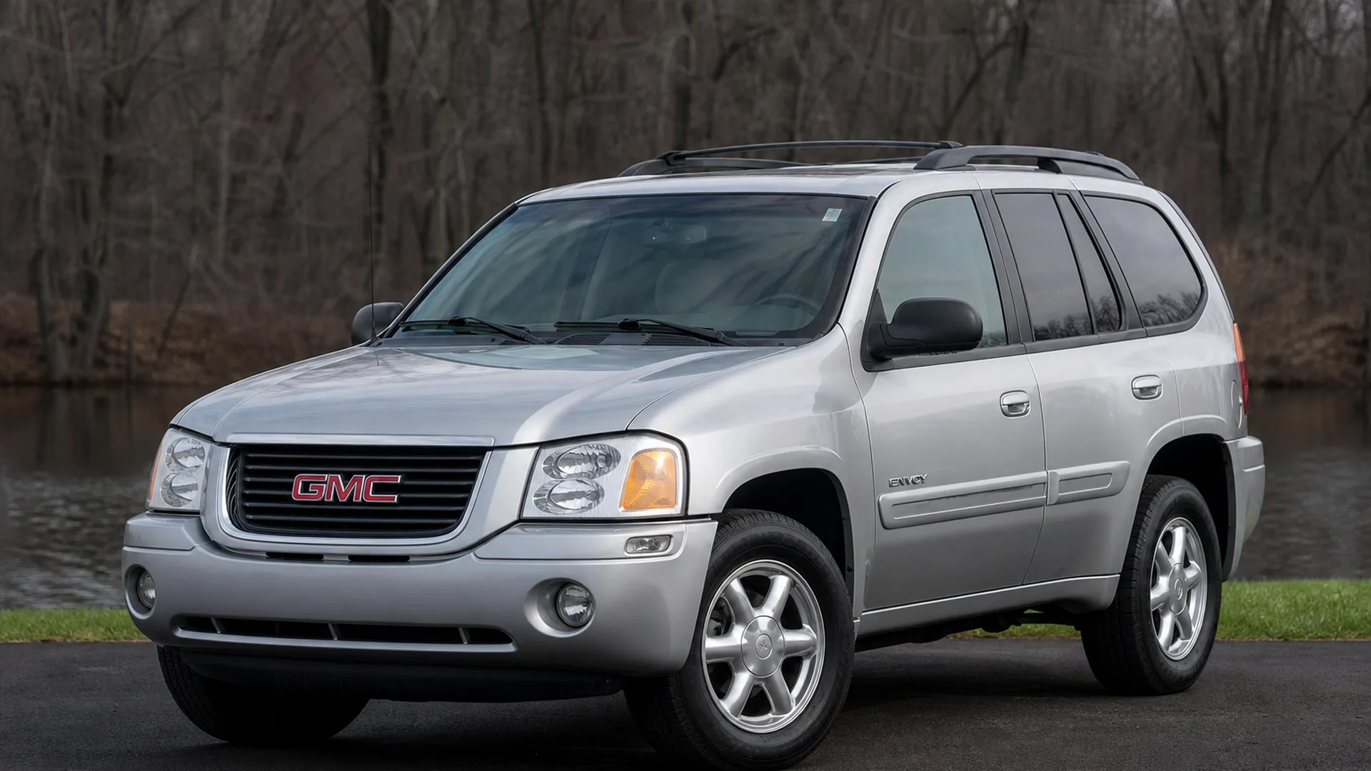 A GMC Envoy parked outdoors.