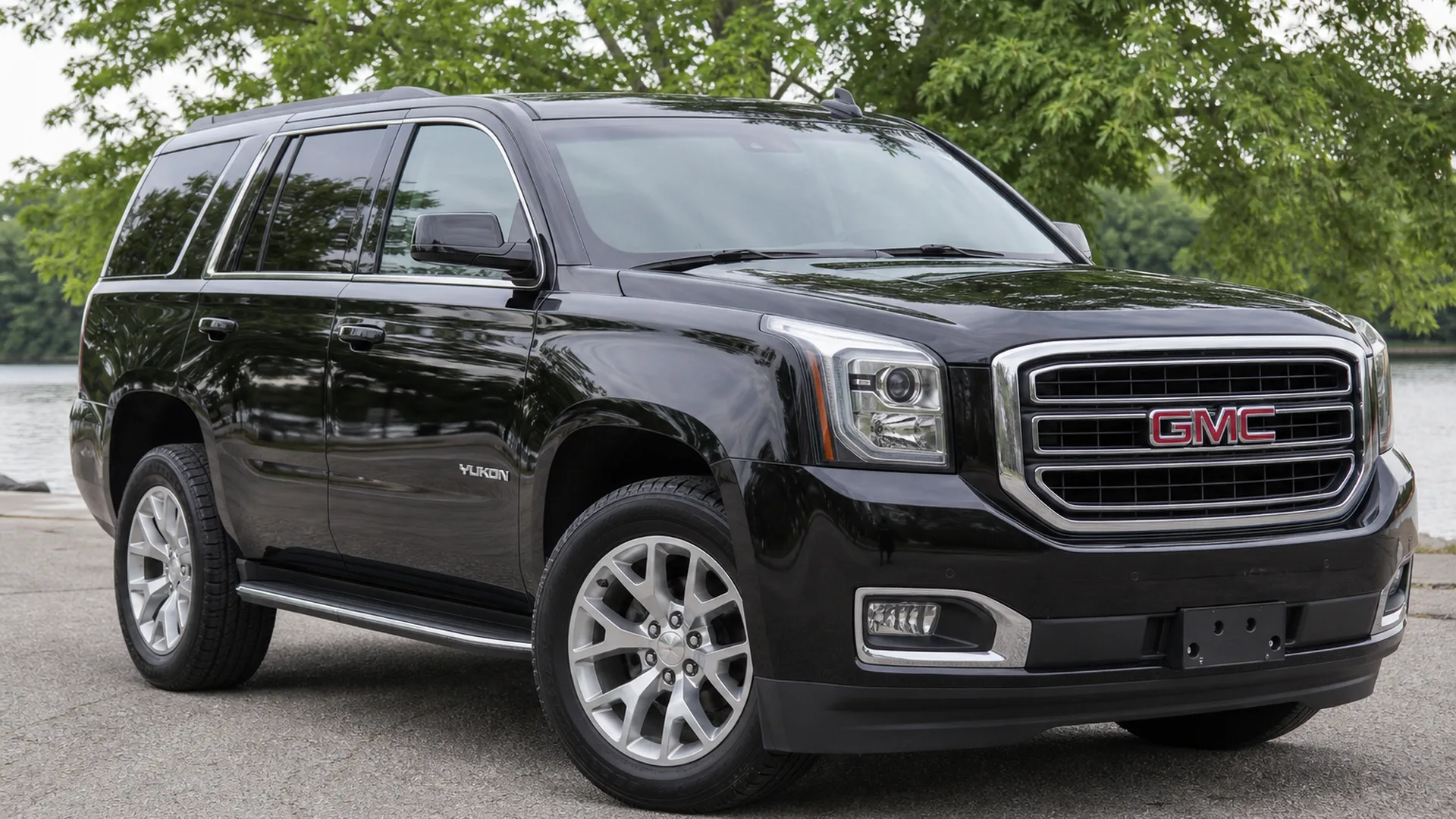 A GMC Yukon parked outdoors.