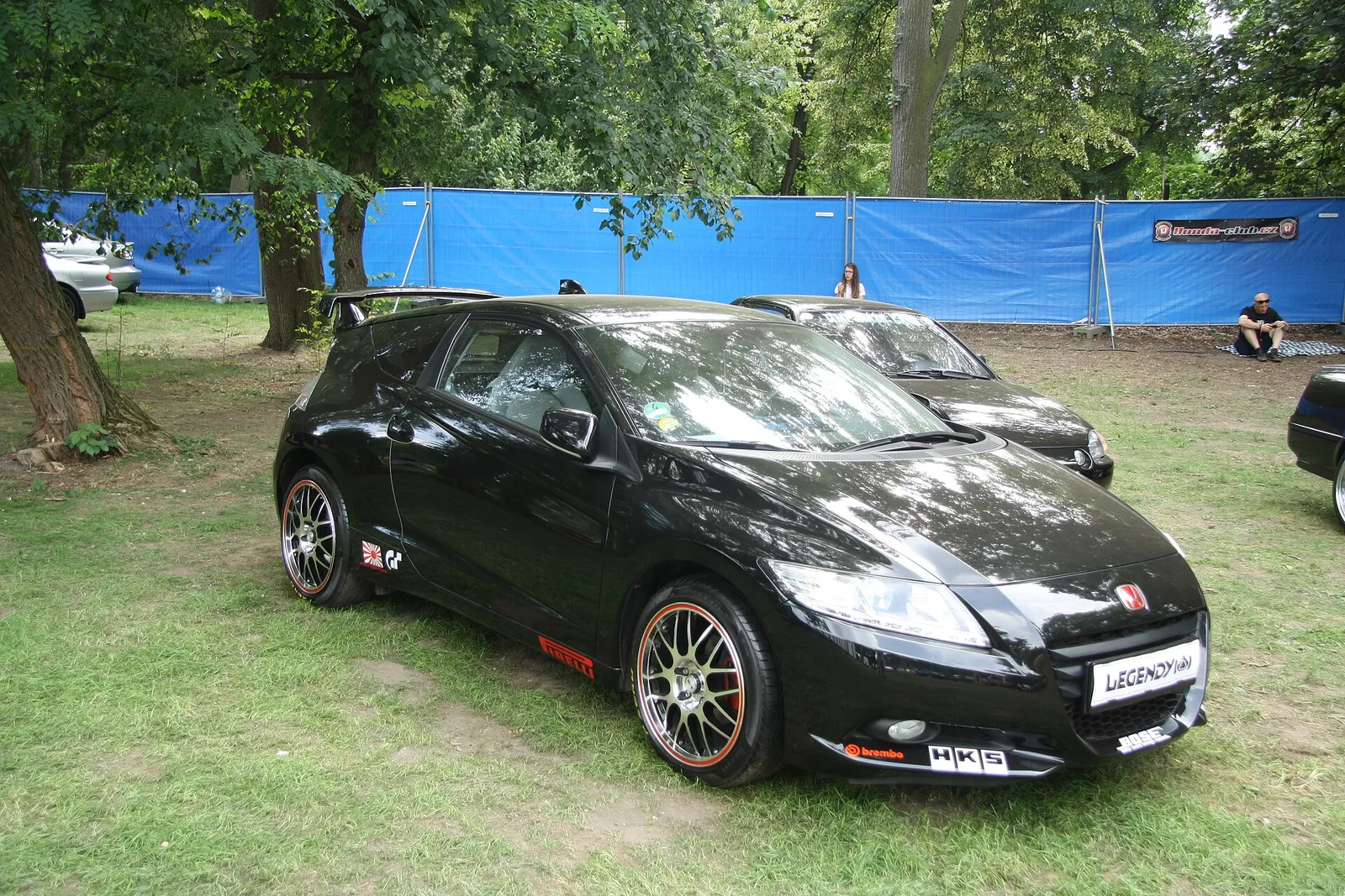 A Honda CR-Z hybrid sport coupe parked outdoors.