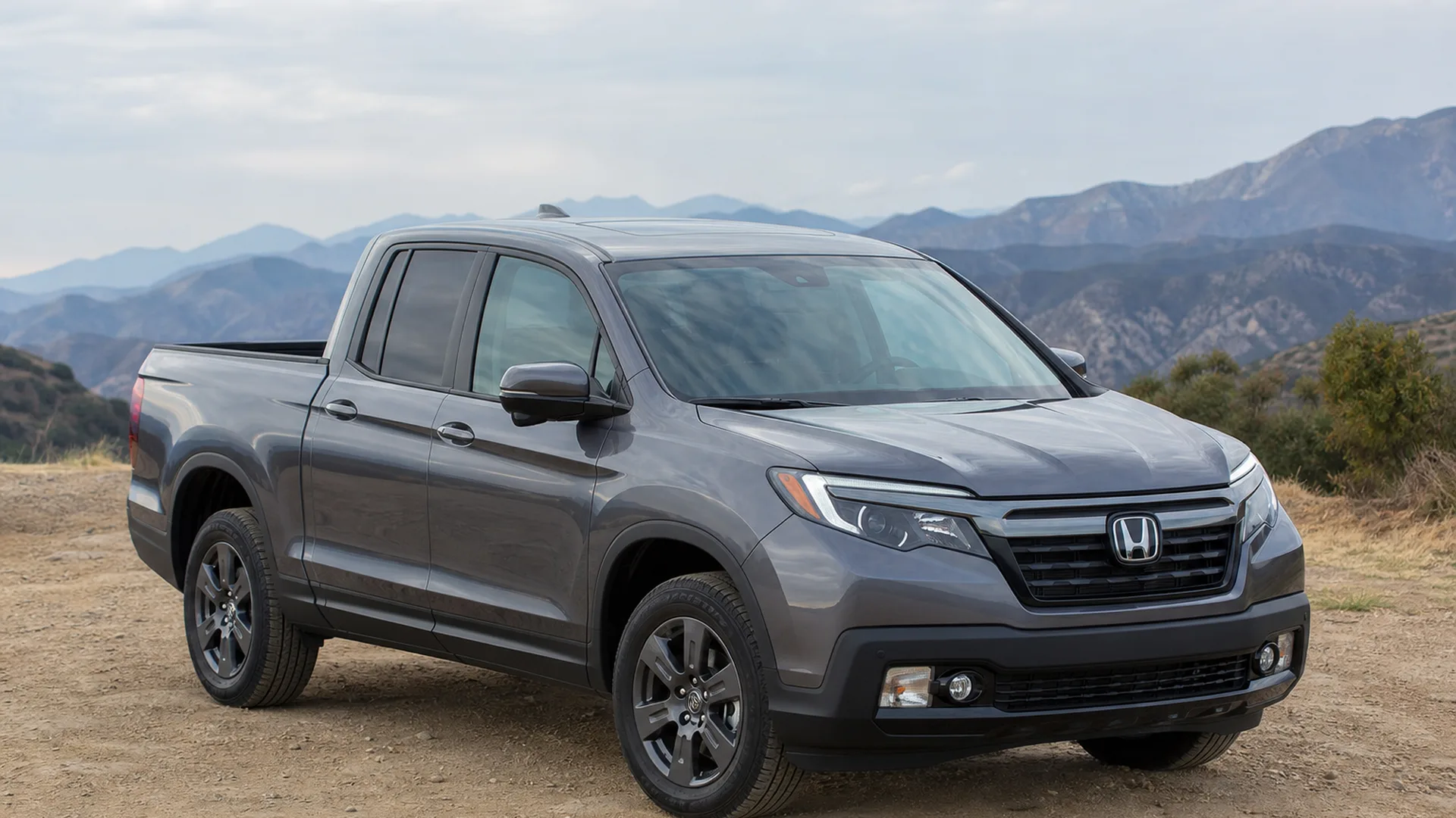 A Honda Ridgeline parked outdoors.