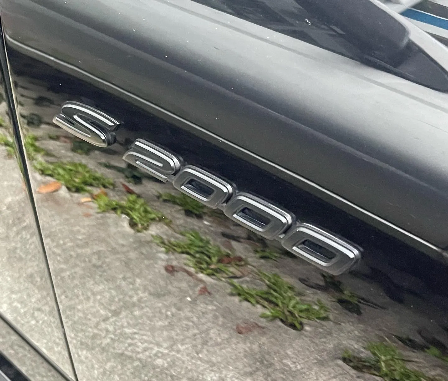 A Honda S2000 roadster parked outdoors.