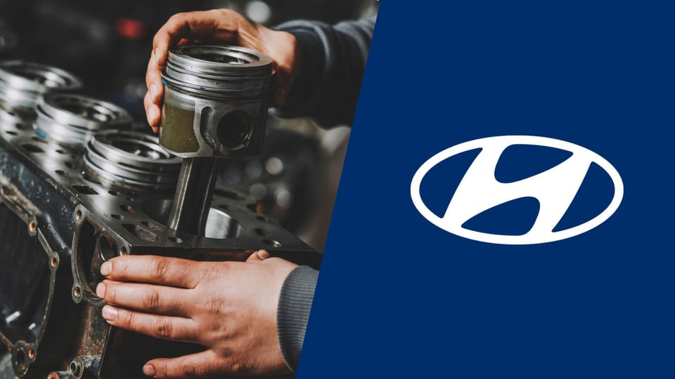 A man is working on a hyundai engine.|A white tesla sports car with four numbers on it.|A white tesla sports car with four numbers on it.|A white tesla sports car with four numbers on it.|A white tesla car with blue numbers on the hood.|A white car with blue numbers on the hood.|A white car with blue numbers on the hood.|A white tesla sports car with four numbers on it.