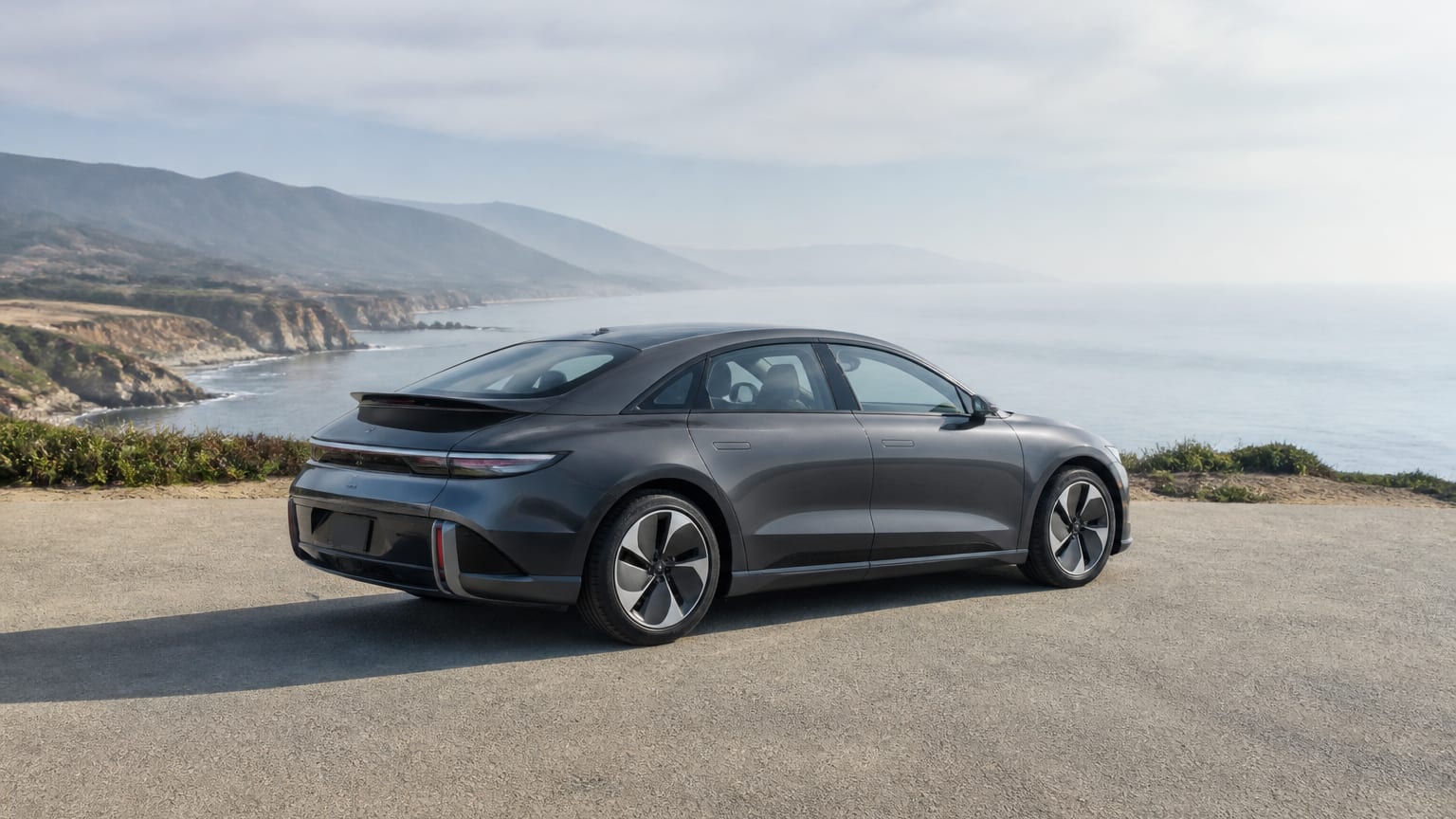A Hyundai Ioniq 6 parked outdoors, three-quarter front view.
