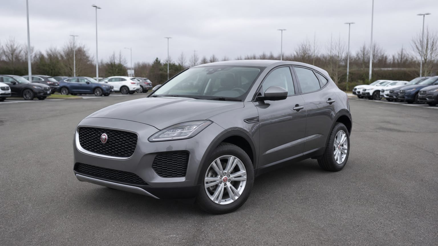 A higher-risk Jaguar E-Pace model year parked in a dealership lot.