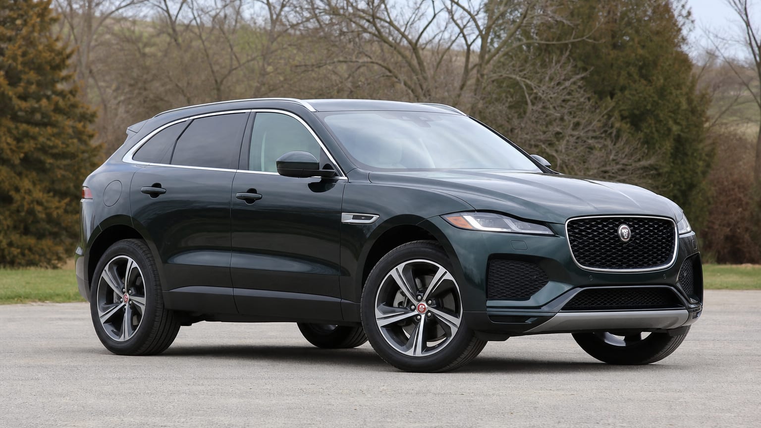 A Jaguar F-Pace parked outdoors, three-quarter front view.