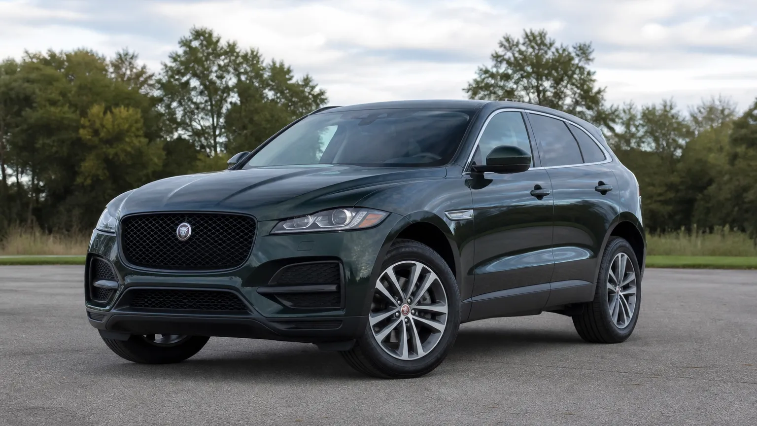 A Jaguar F-Pace SUV, three-quarter front view, parked outdoors.