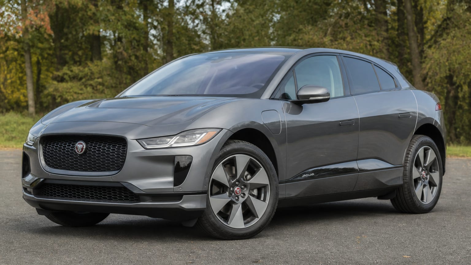 A Jaguar I-Pace parked outdoors, three-quarter front view.