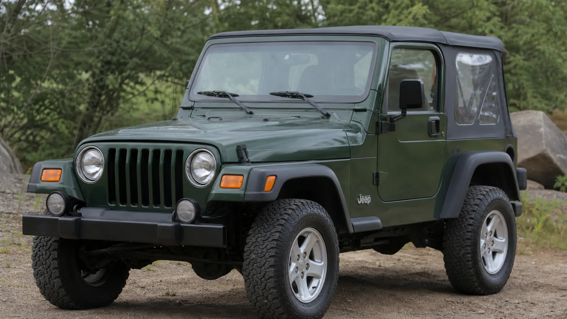 A Jeep TJ parked outdoors.