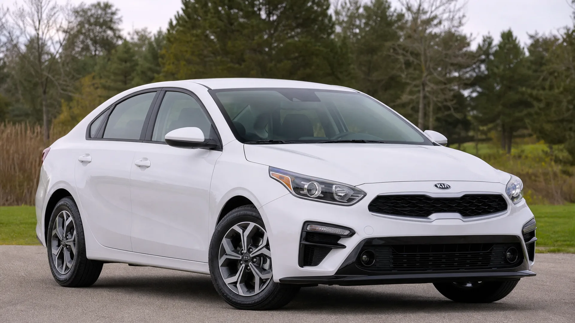A Kia Forte parked outdoors.
