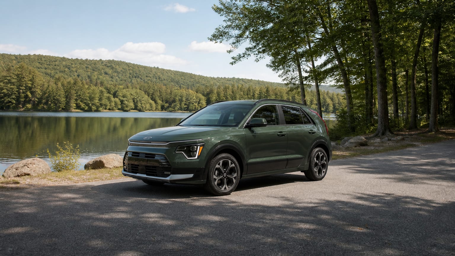 A cleaner later-model Kia Niro on a quiet road.