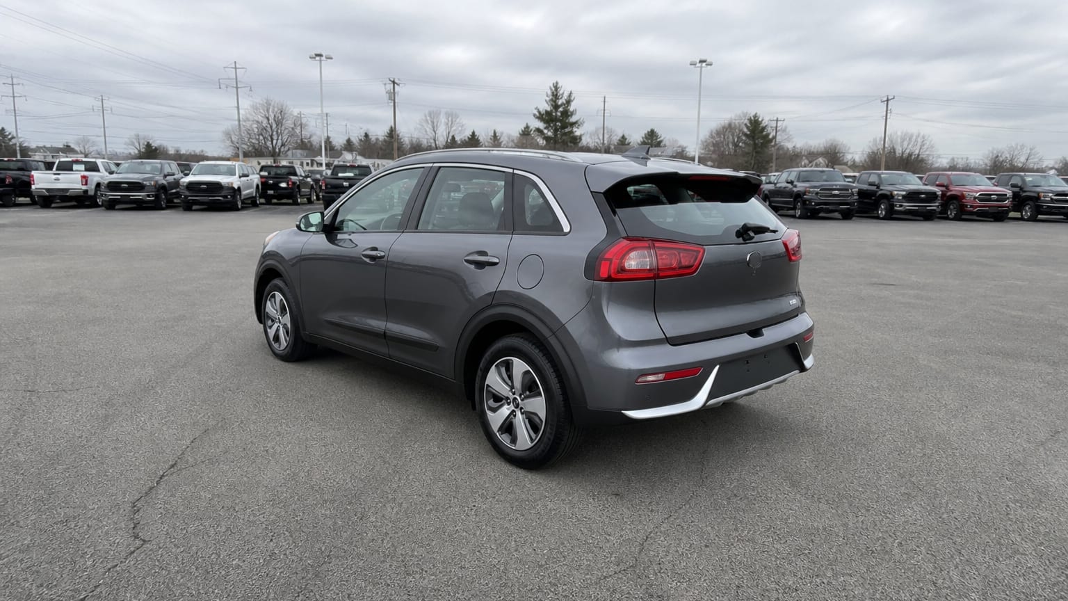 A higher-risk Kia Niro model year parked in a dealership lot.