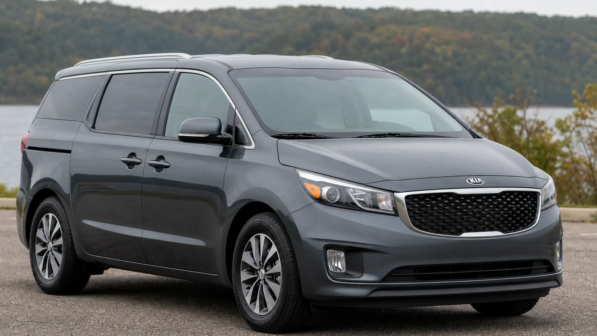A Kia Sedona parked outdoors.