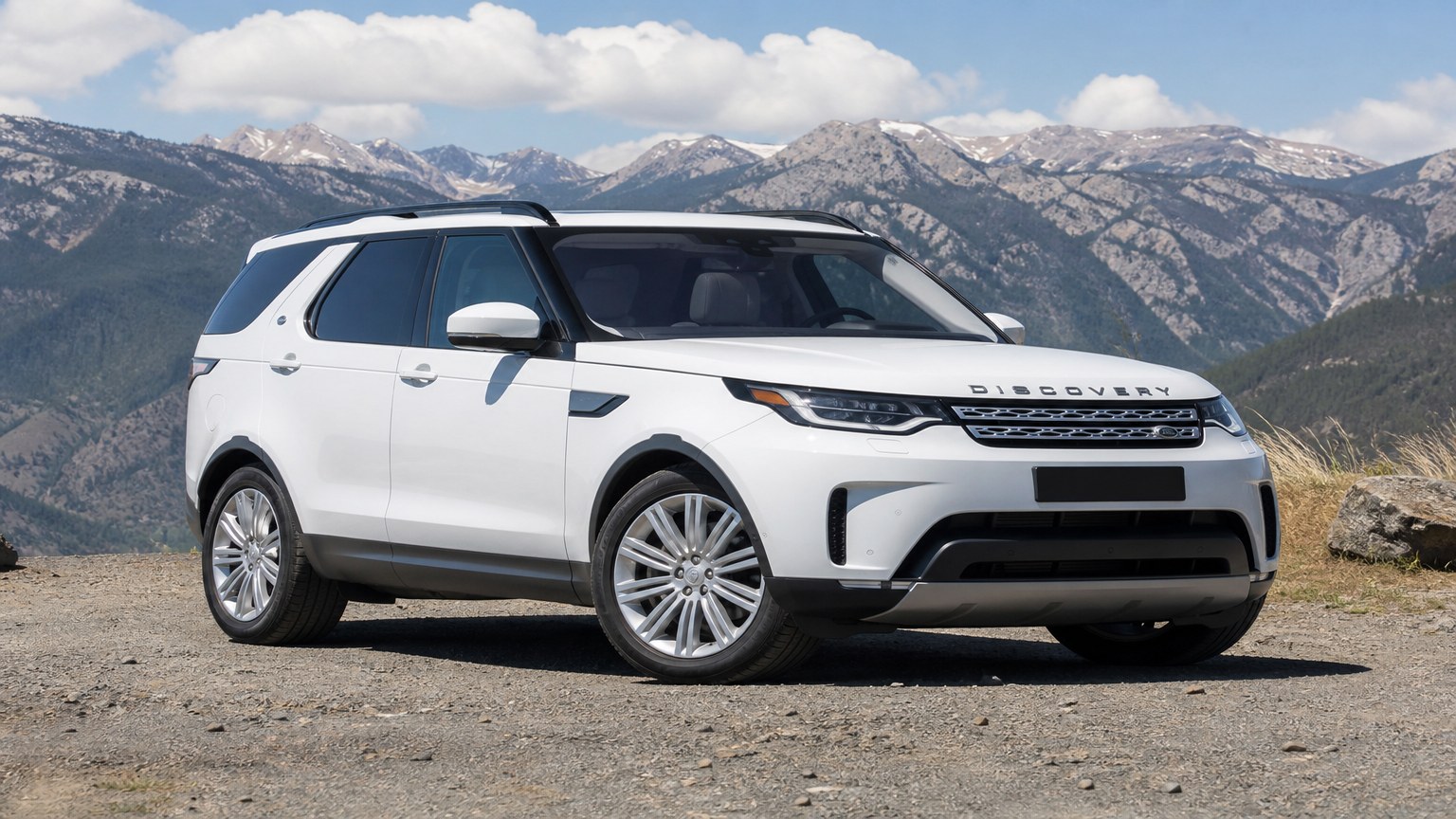 A higher-risk Land Rover Discovery model year parked in a dealership lot.