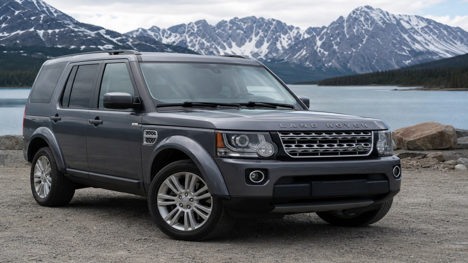 A cleaner later-model Land Rover LR4 on a quiet road.