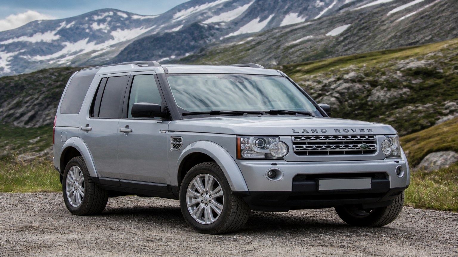 A Land Rover LR4 parked outdoors, three-quarter front view.