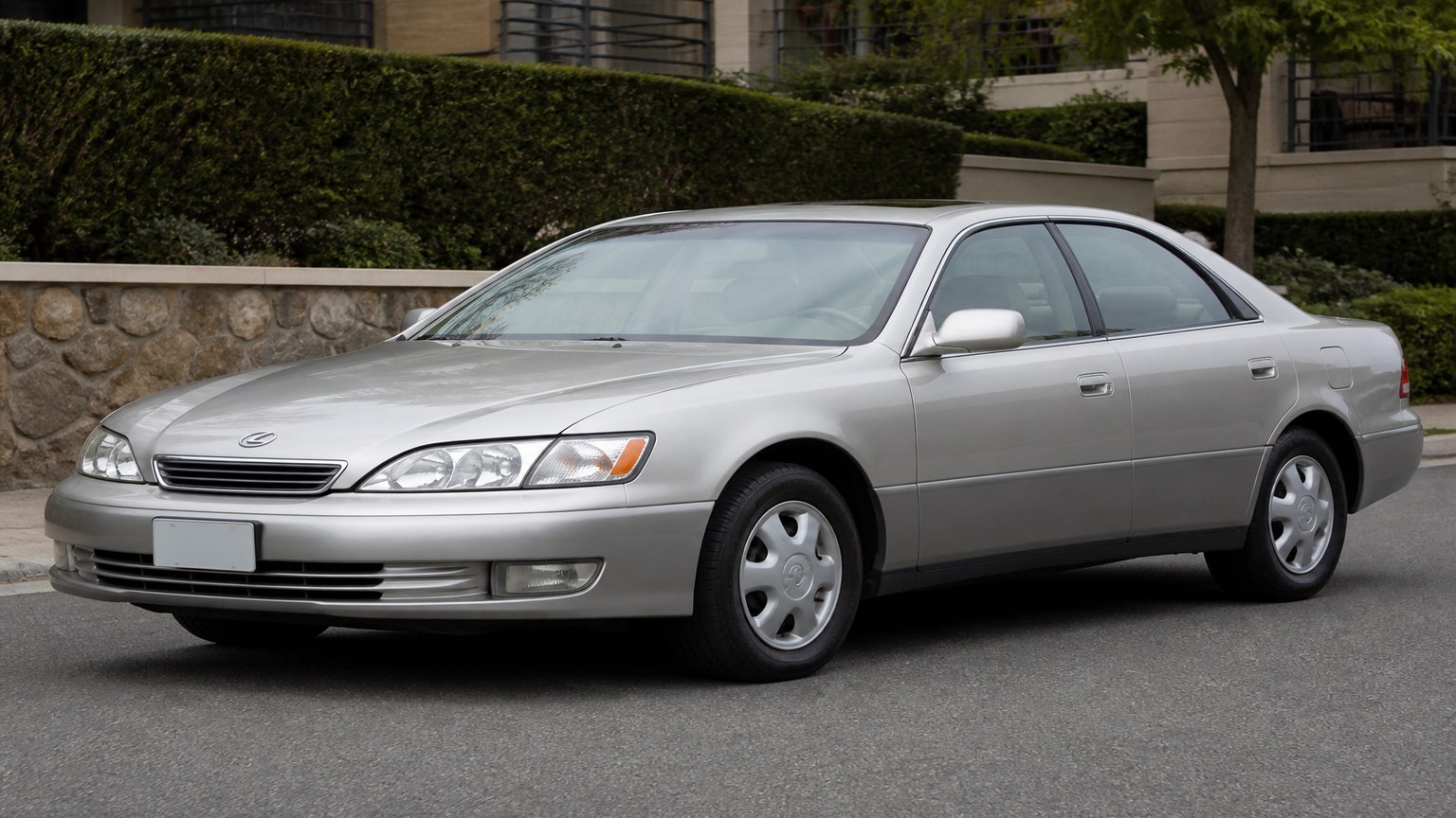 A cleaner later-model Lexus ES 300 on a quiet road.