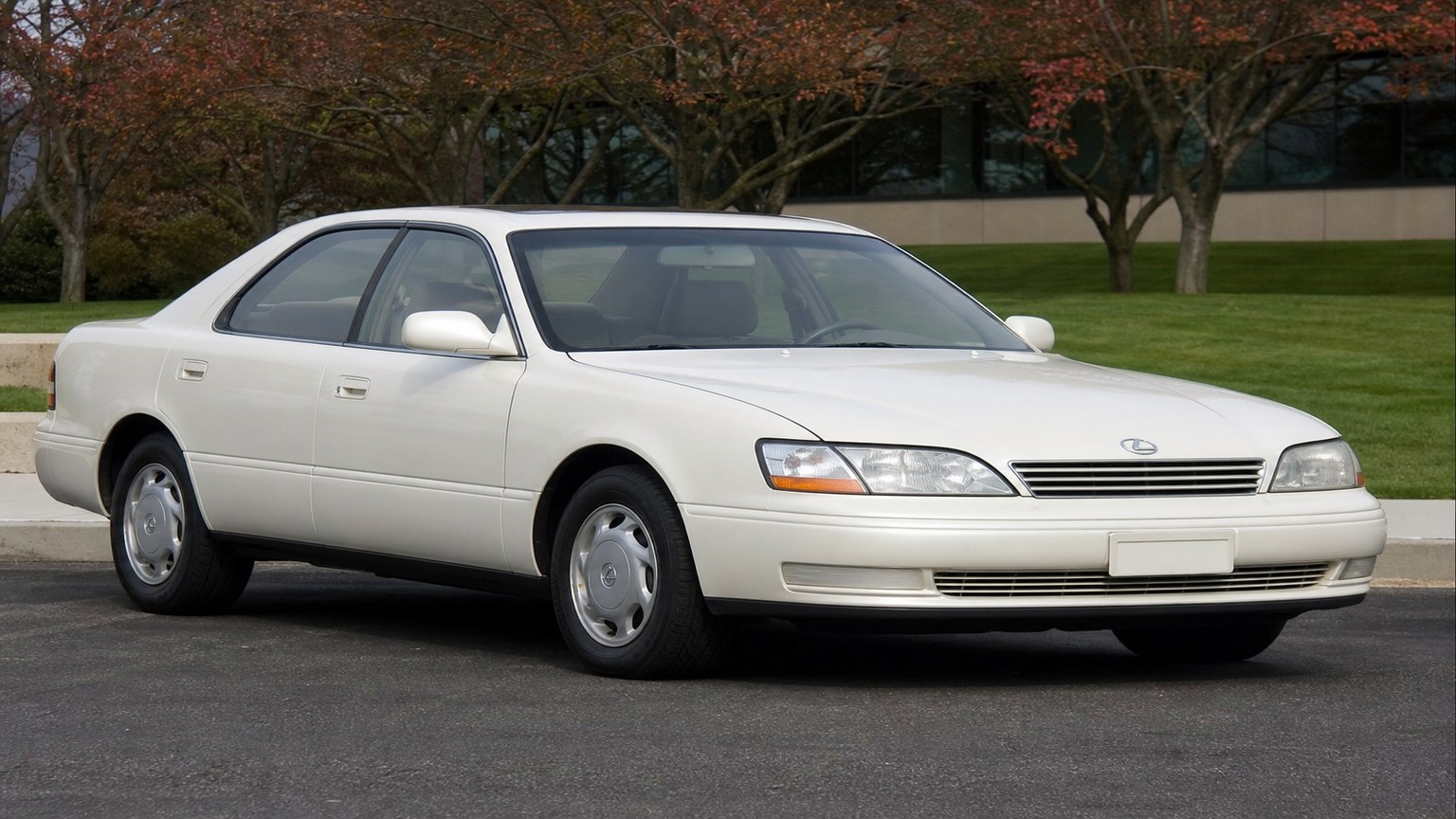 A higher-risk Lexus ES 300 model year parked in a dealership lot.
