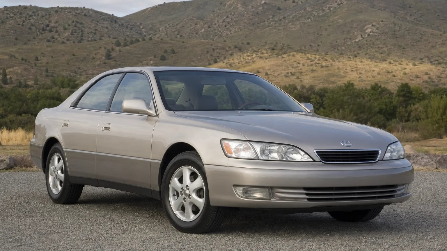 A Lexus ES 300 midsize sedan, three-quarter front view, parked on a quiet street.