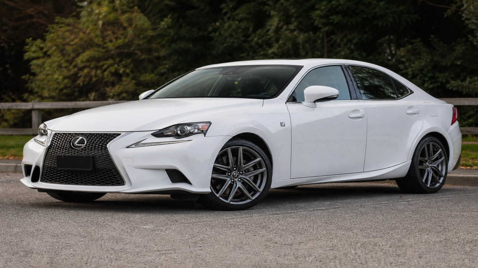 A higher-risk Lexus IS 300 model year parked in a dealership lot.