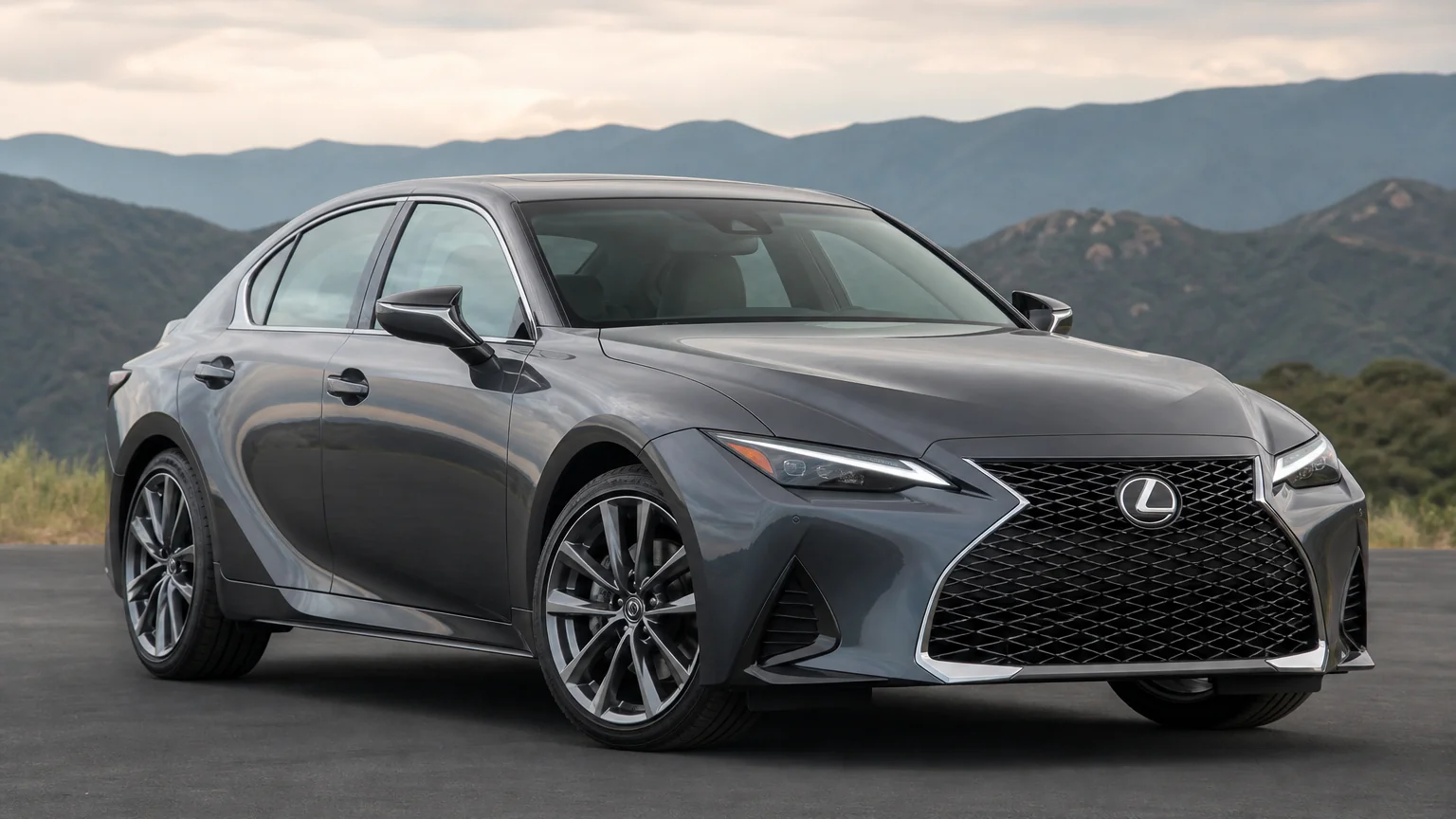 A Lexus IS 300 compact sport sedan, three-quarter front view, parked on a quiet street.
