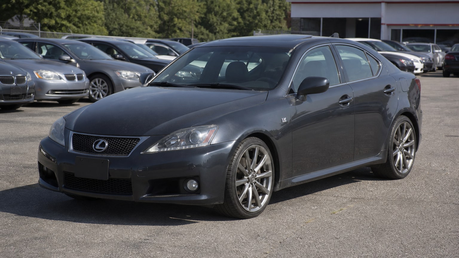 A higher-risk Lexus IS 500 model year parked in a dealership lot.