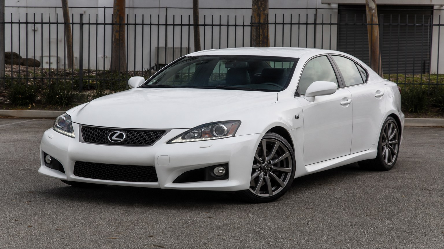 A cleaner later-model Lexus IS F on a quiet road.