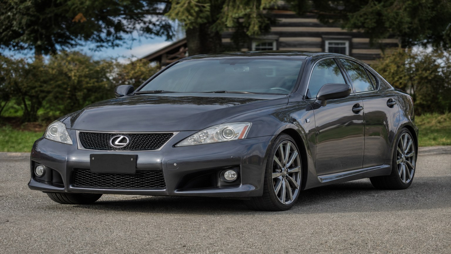 A higher-risk Lexus IS F model year parked in a dealership lot.